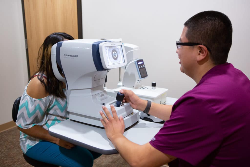 Doctor performing an eye exam